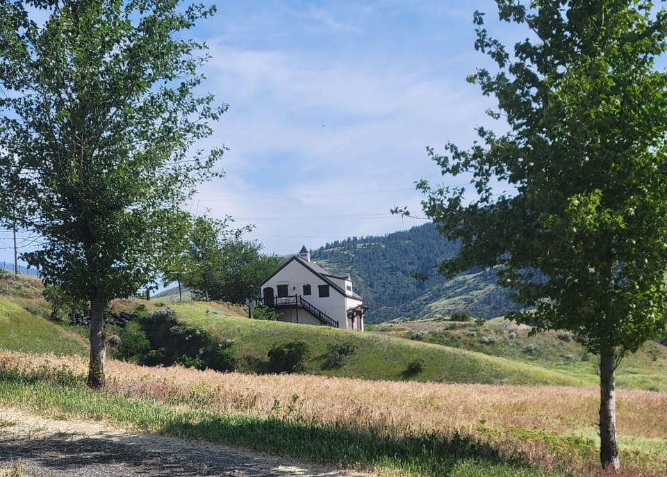 On the gravel road up to entrance. 
