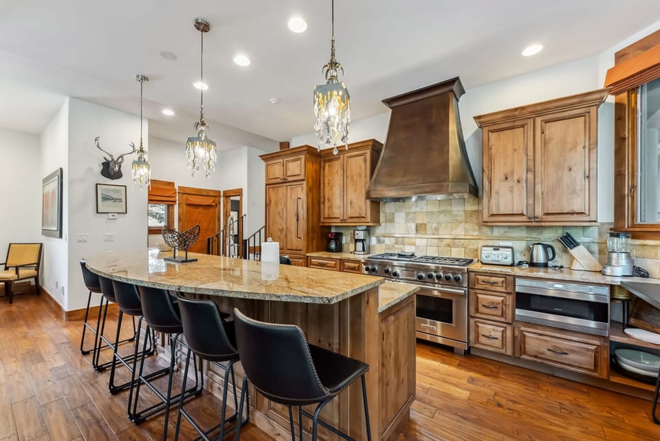 Kitchen: Main floor, Sub-Zero fridge/freezer, Wolf oven and griddle, dual dishwashers, drip coffee maker, toaster, blender, electric kettle