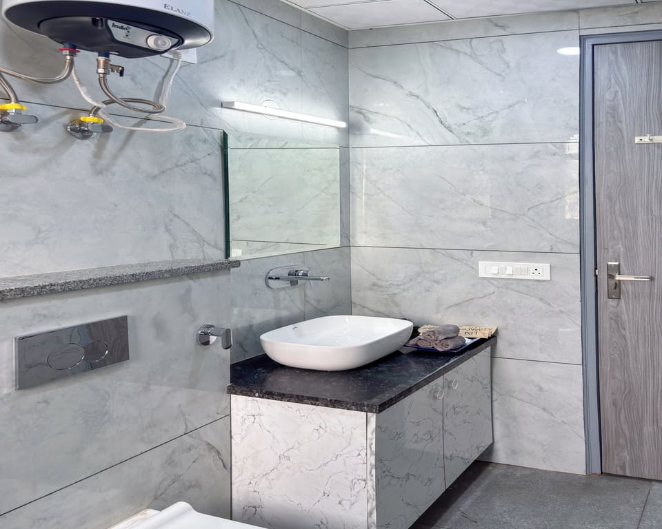 Studio, City View | Bathroom | Shower, slippers, towels, soap