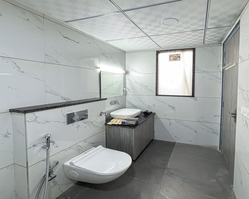 Studio, City View | Bathroom | Shower, slippers, towels, soap