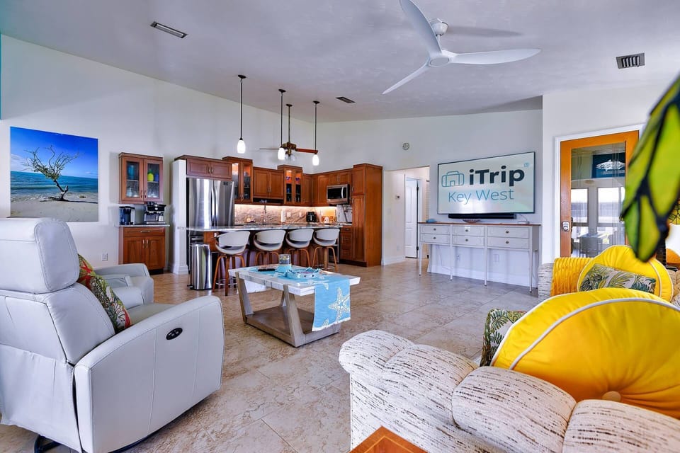The open floor plan from the kitchen to the living room keeps everyone connected and part of the conversation.