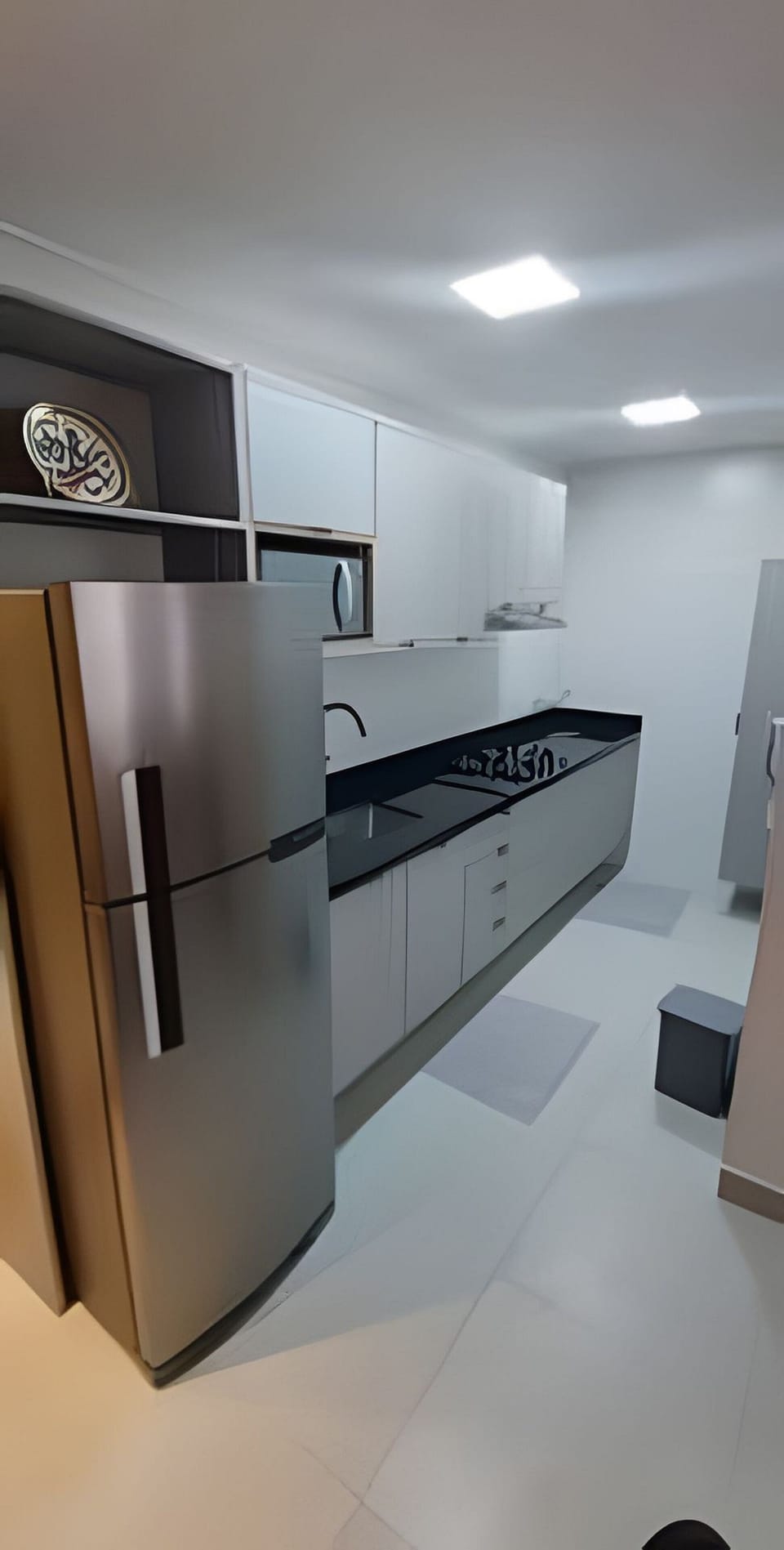 Apartment | Private kitchen | Fridge, microwave, stovetop, cookware/dishes/utensils