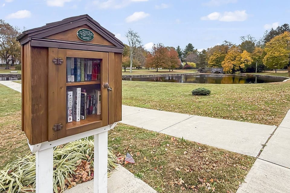 Charming freestanding library, pick a book, find a spot and relax at Duck Pond.