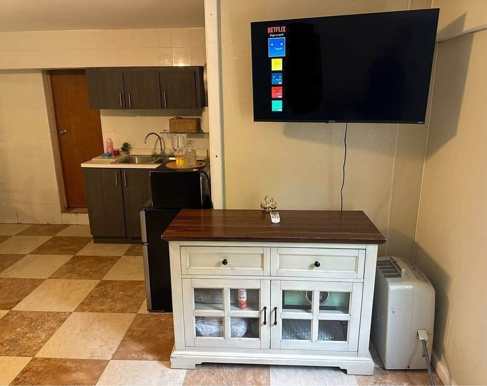 This cozy retreat offers a nice room with a Queen bed, a comfy futon, and a refreshing shower; perfect for unwinding after a day of exploring. 