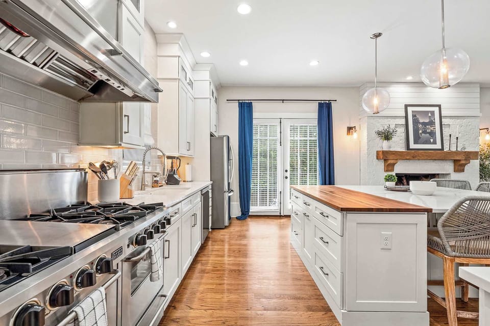 Sleek high-end appliances meet abundant cabinetry — where function and luxury come together.