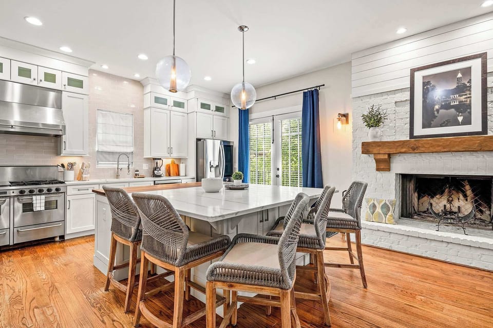 Open floor living at its finest — cook, chat, and relax with views of the living room right from the kitchen island.