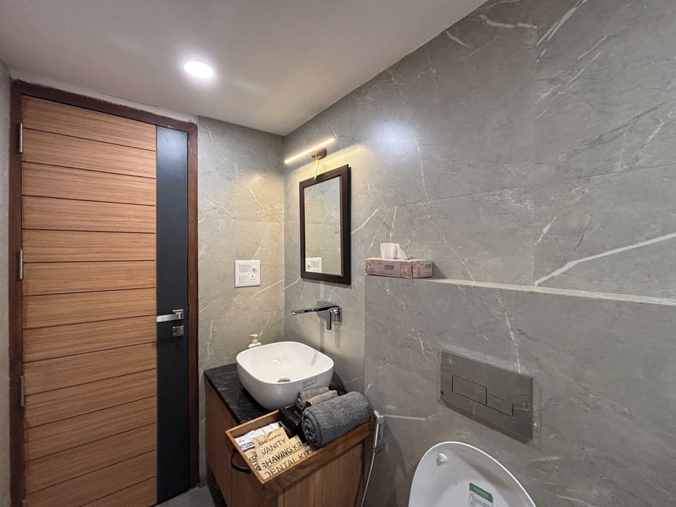 Studio, City View | Bathroom | Shower, free toiletries, slippers, bidet