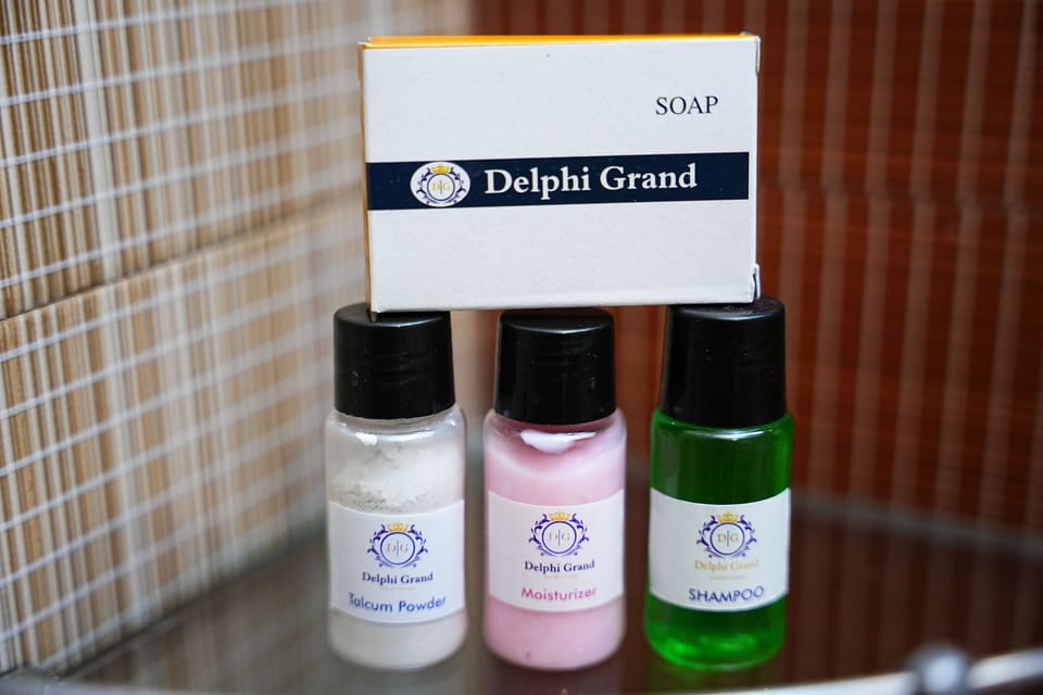Business Room | Bathroom | Shower, hair dryer, slippers, towels