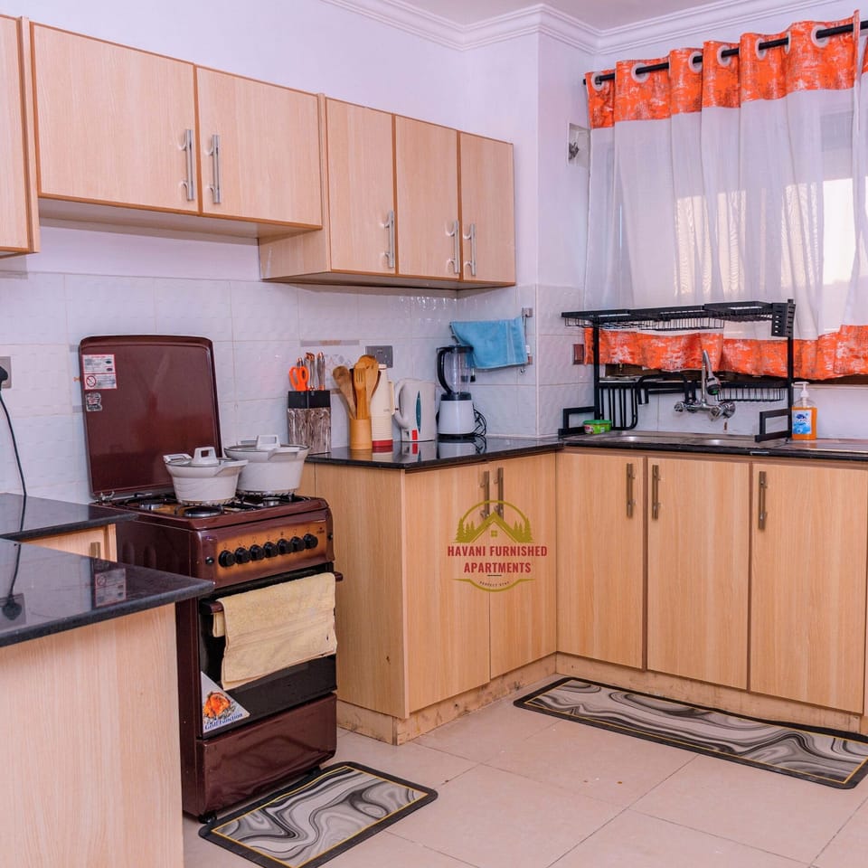Family Apartment, City View | Private kitchen | Fridge, microwave, cookware/dishes/utensils
