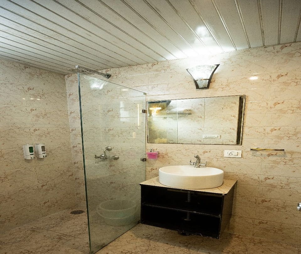 Shower, slippers, towels, soap