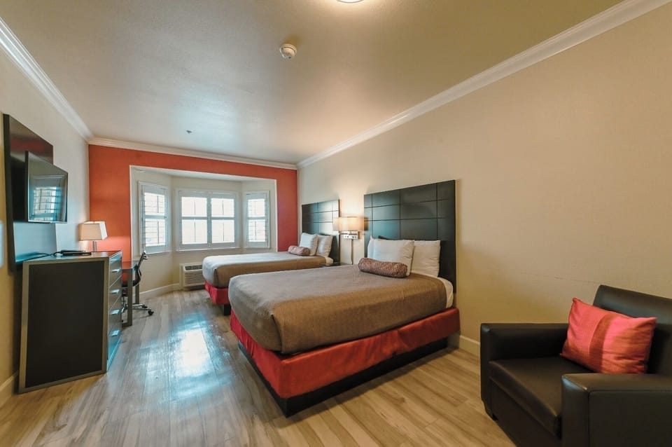 Deluxe Room, 2 Double Beds | Desk, laptop workspace, blackout drapes, iron/ironing board