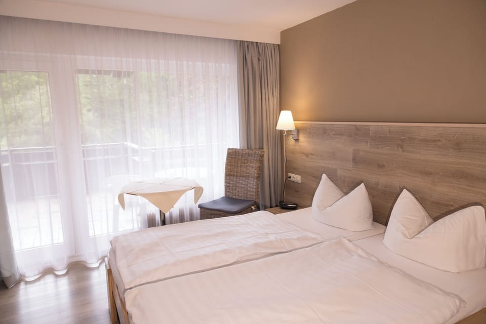 Basic Double Room, Balcony, Mountain View | In-room safe, desk, iron/ironing board, free WiFi
