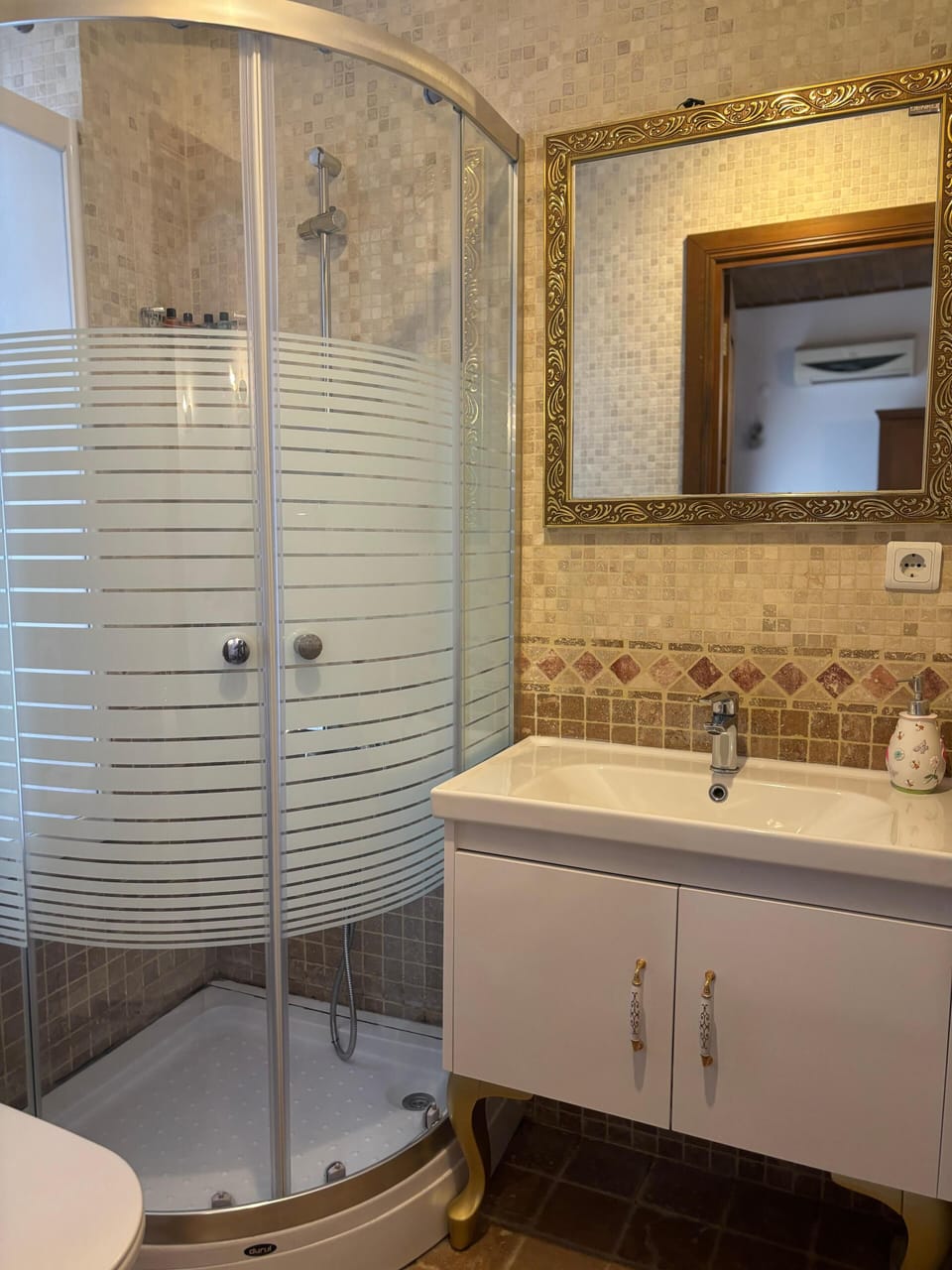 Shower, slippers, bidet, towels