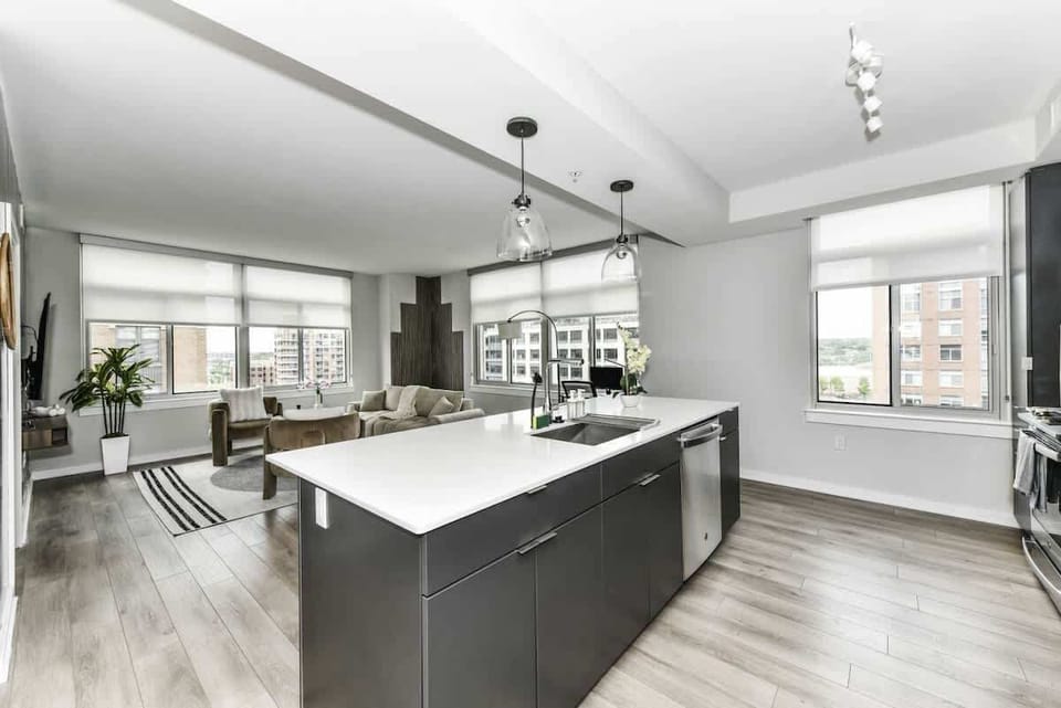 Fully equipped kitchen with a breakfast counter (seats 3) and a dining area (seats 4), plus a high chair available for little ones.