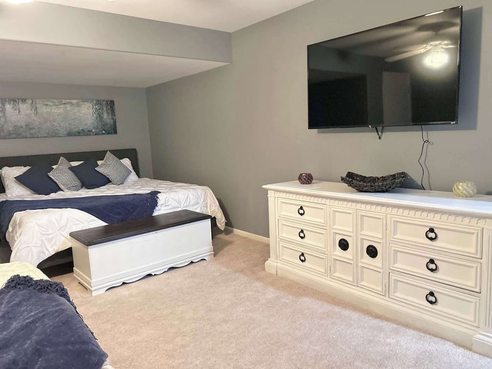 In the sixth bedroom, with two full size dressers and a large walk-in closet, you have plenty of space for all of your personal effects.