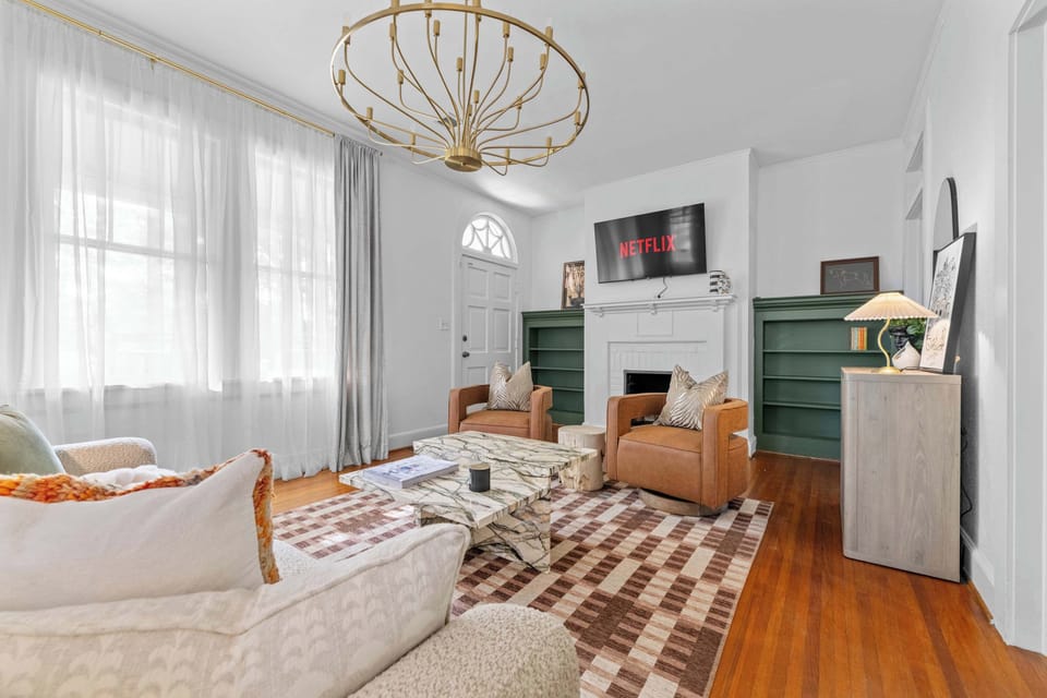 "Bright and inviting living room filled with natural light — a perfect space to relax and gather."