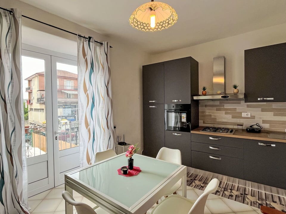Furniture, Interior Design, Kitchen, Flooring, Countertop, Wood, Kitchen Appliance, Major Appliance, Floor, Cabinetry