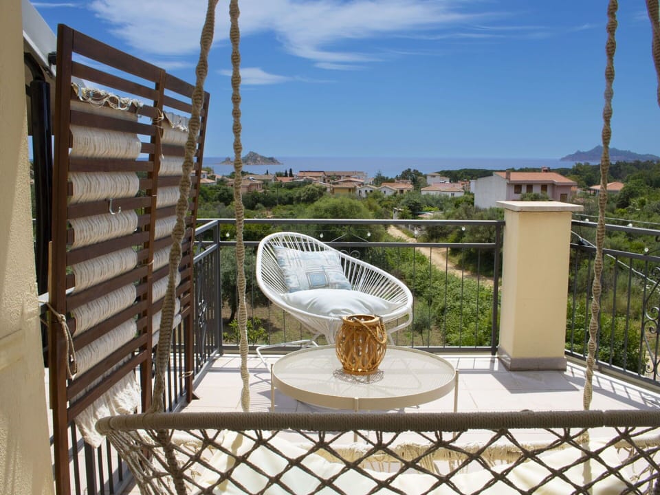 Furniture, Chair, Outdoor Furniture, Balcony, Shade, Apartment, Outdoor Table, Eco Hotel, Coffee Table, Resort