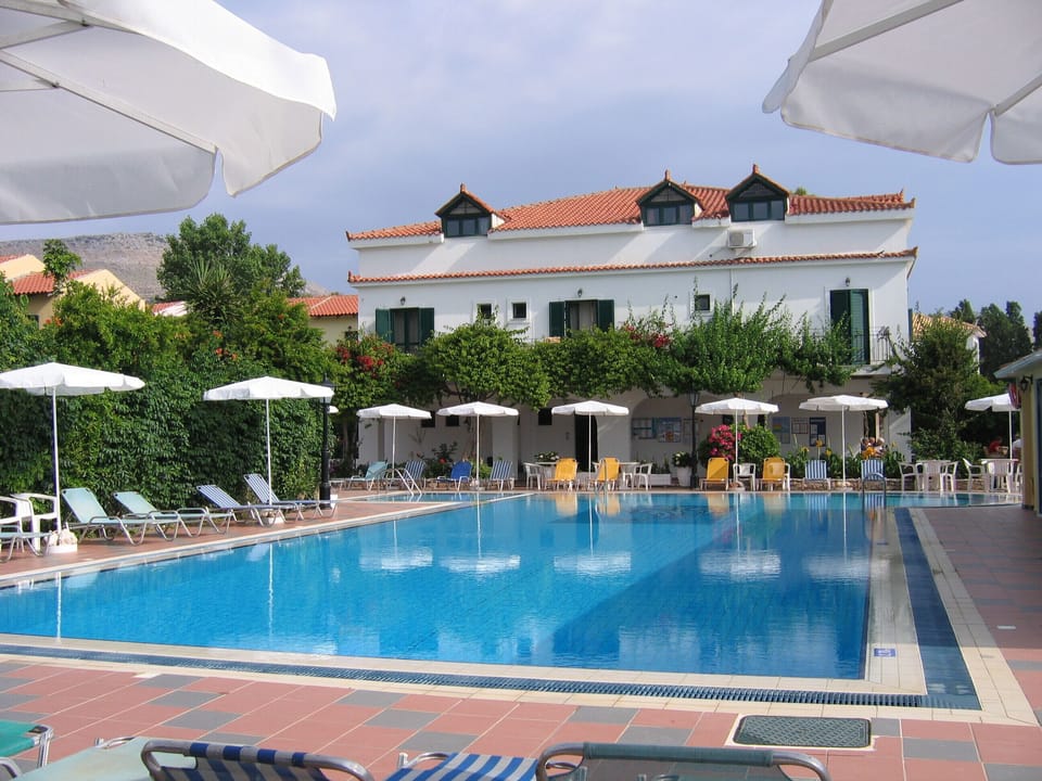 Seasonal outdoor pool, pool umbrellas, sun loungers