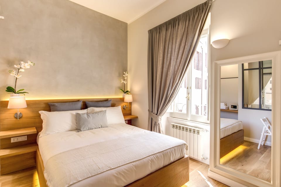 Deluxe Room | Premium bedding, in-room safe, desk, soundproofing