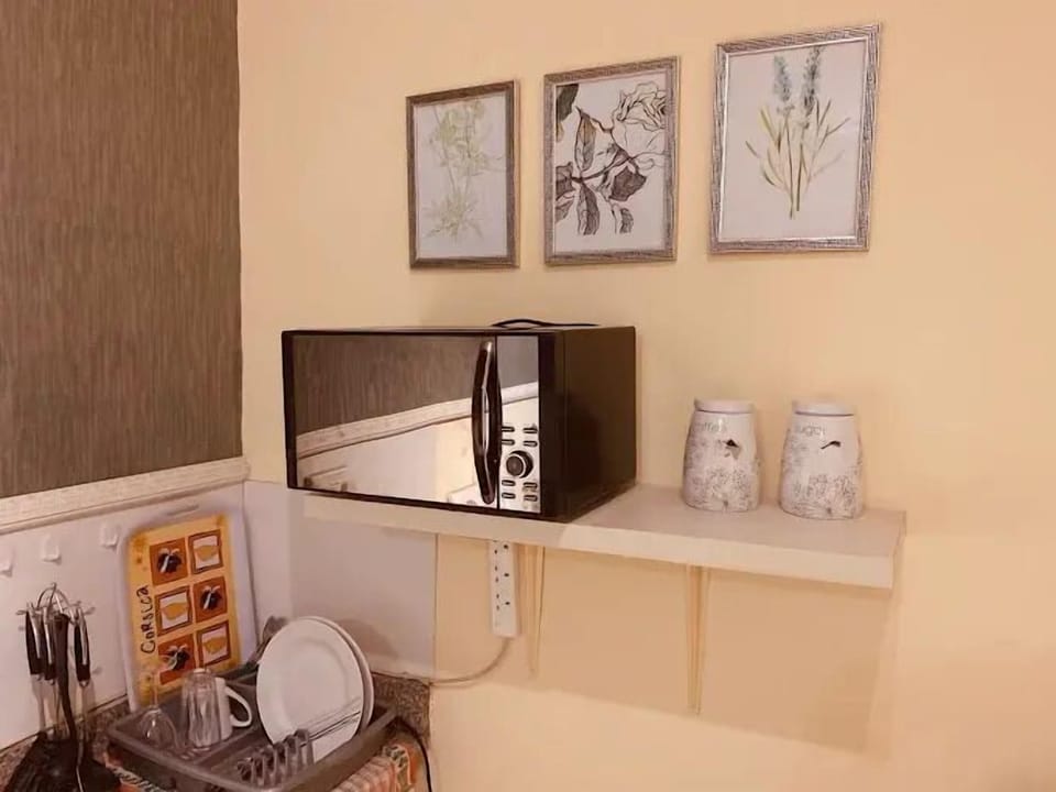 Economy Room, Balcony, City View | Private kitchen | Mini-fridge