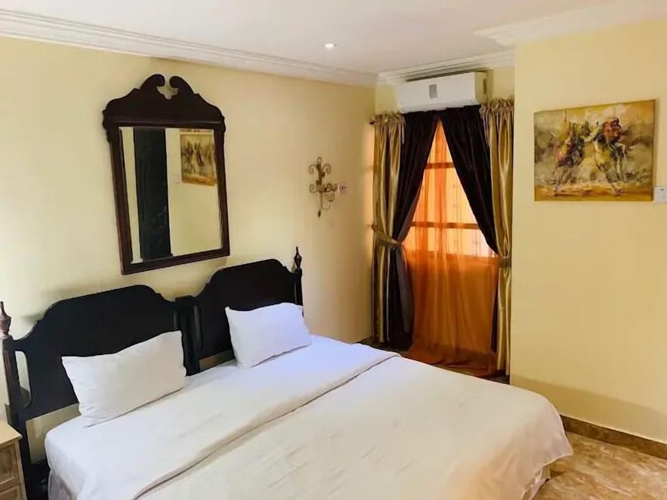 Economy Room, Balcony, City View | Desk, laptop workspace, blackout drapes, soundproofing