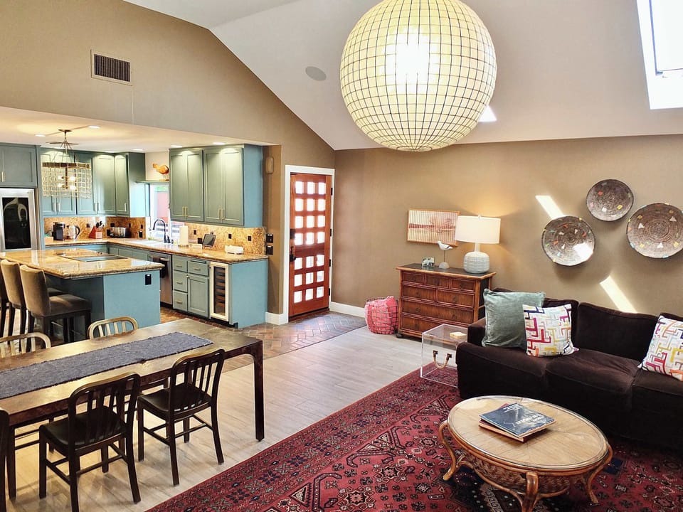 Cozy living area with high ceilings, and Smart TV 