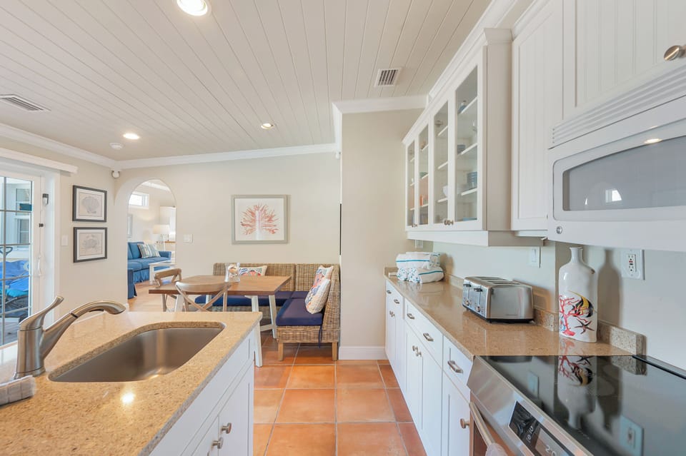 Fully equipped kitchen with granite counters and stainless appliances