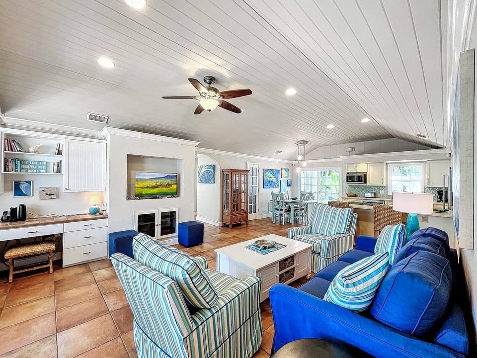 Living room with plenty of seating and flat screen  TV