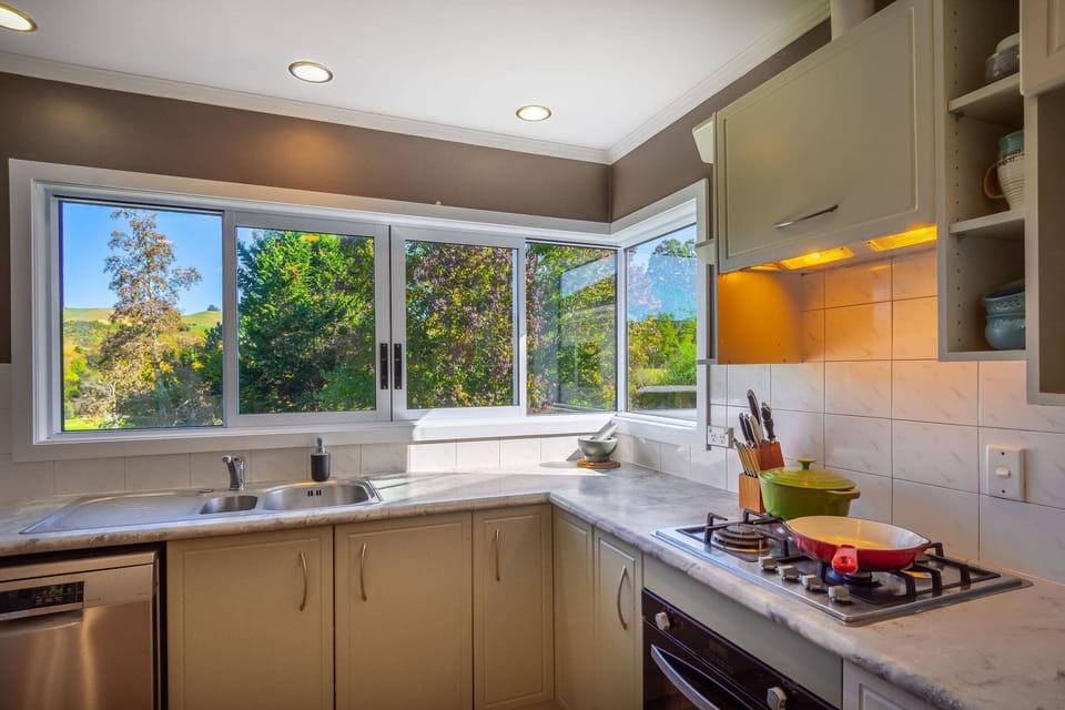 Kitchen with garden view over the sink
