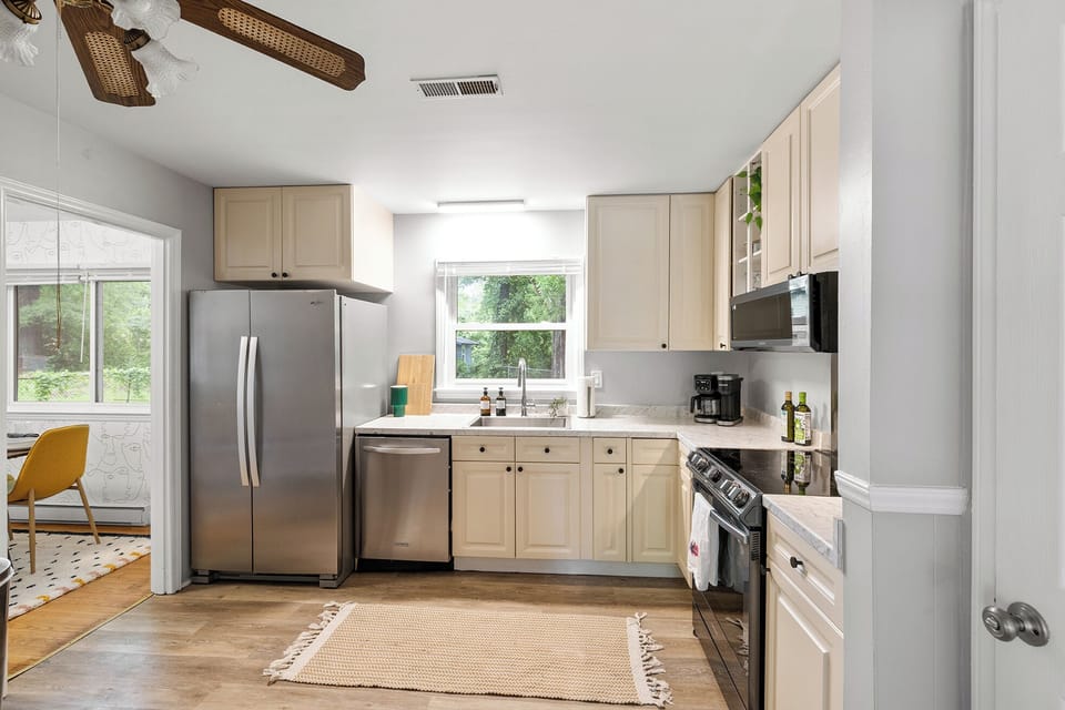 Spacious kitchen with ceiling fan