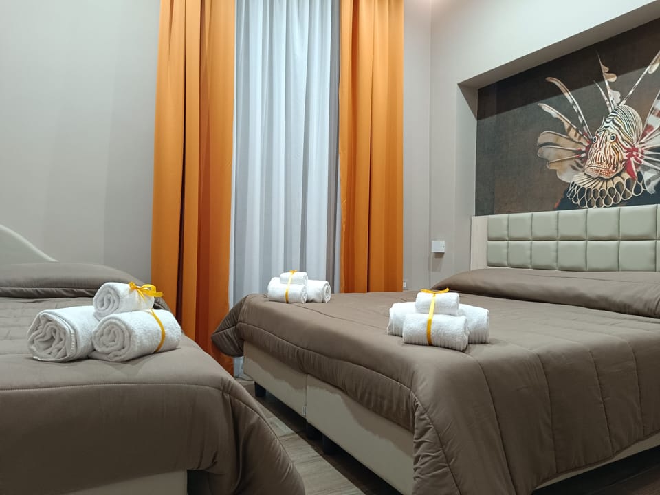 Standard Triple Room | Down comforters, desk, blackout drapes, iron/ironing board