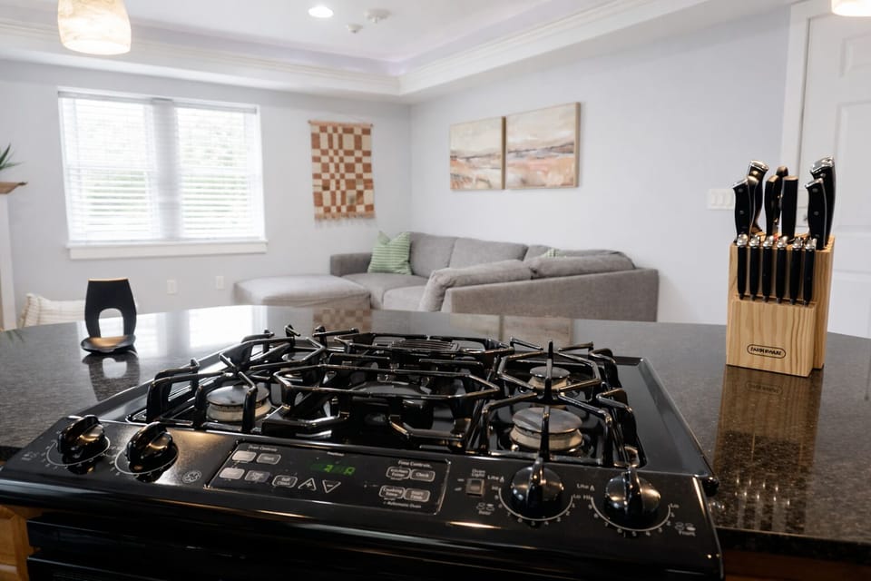 Cook with ease on the modern gas range—perfect for quick breakfasts or full home-cooked meals.