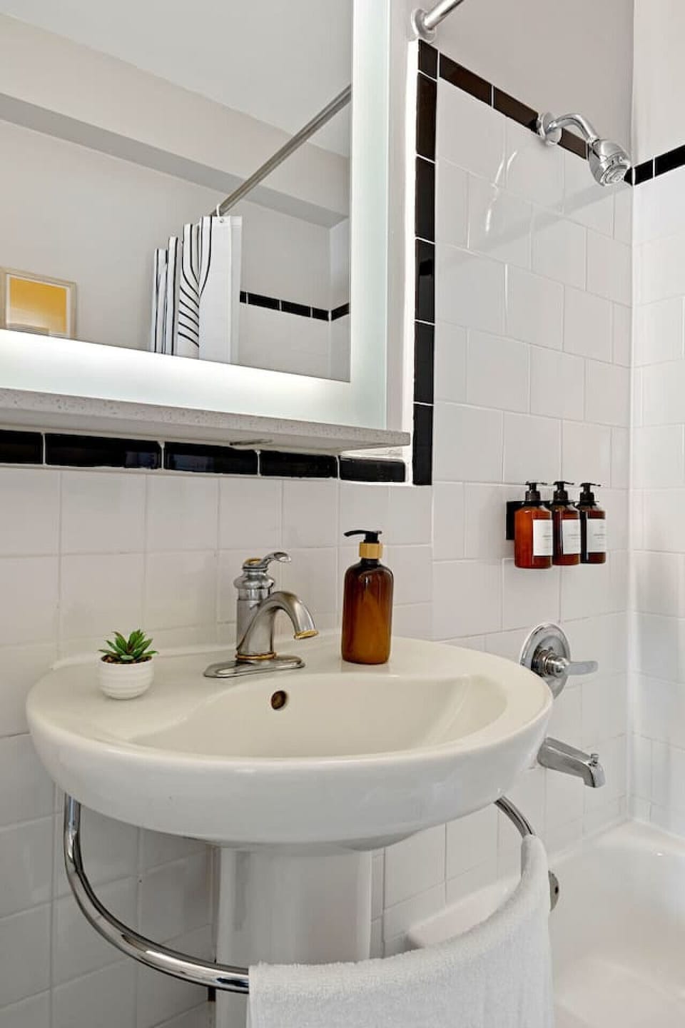 Modern full bathroom with a bathtub—ideal for both quick showers and relaxing baths.