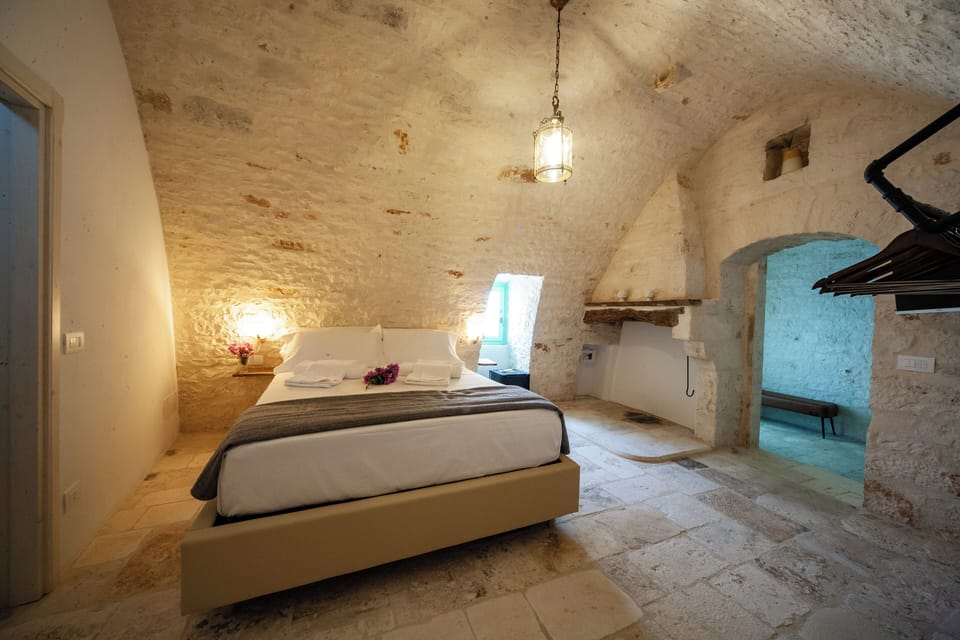 Luxury Suite, Balcony, City View | Frette Italian sheets, premium bedding, down comforters, pillowtop beds