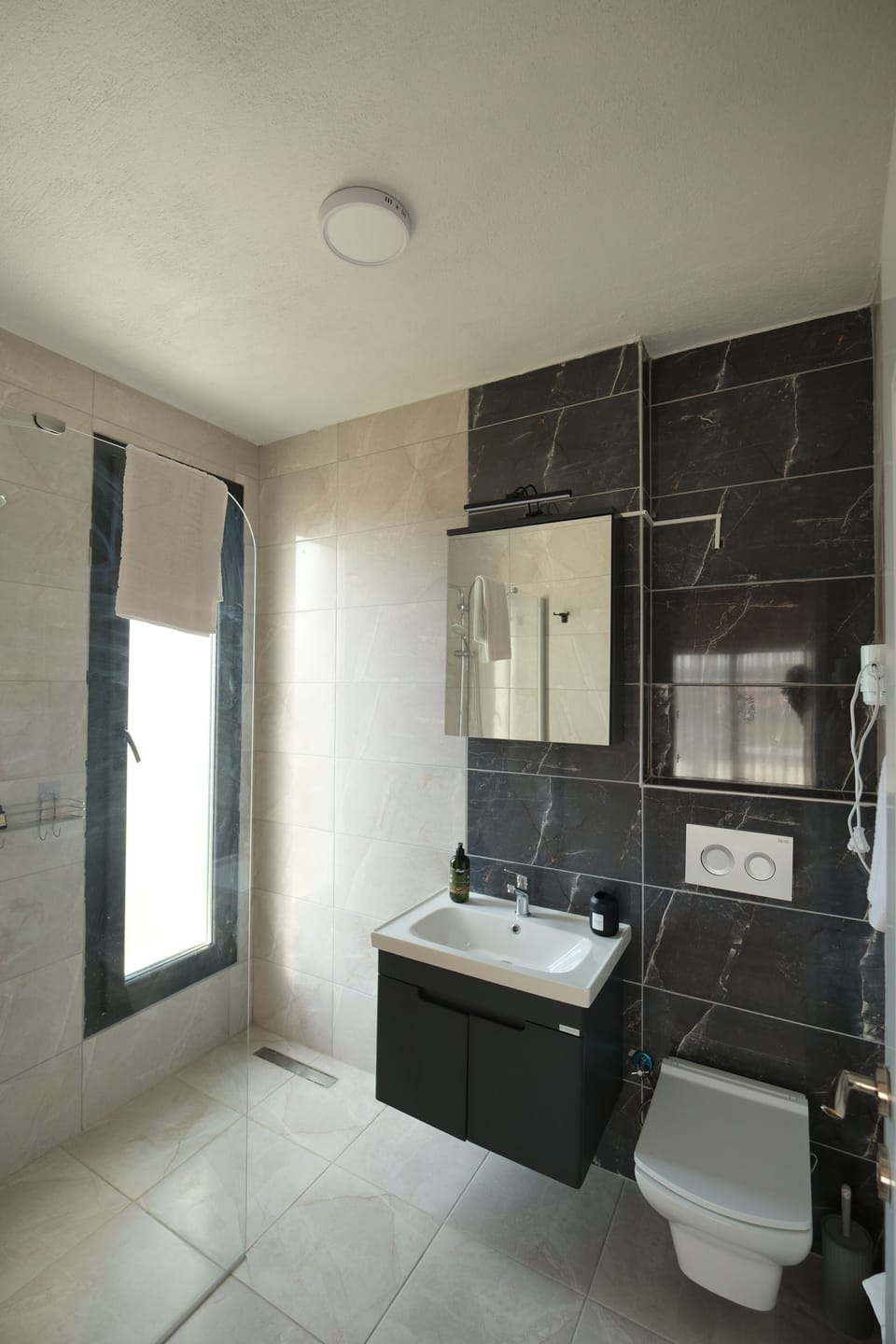 Sakiz Oda ( Standart Room with Street View ) | Bathroom | Shower, hair dryer, slippers, towels