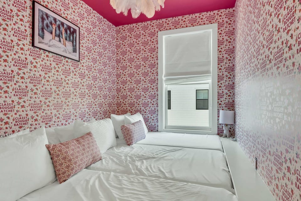 *Custom built in 3 single beds, custom draperies and wallpaper.