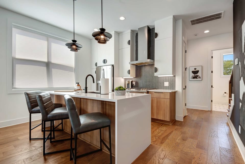 *The kitchen is a great space to make meals and stay in for a movie night or to make the perfect Music City cocktail before walking over to Geodis Park to catch a concert.