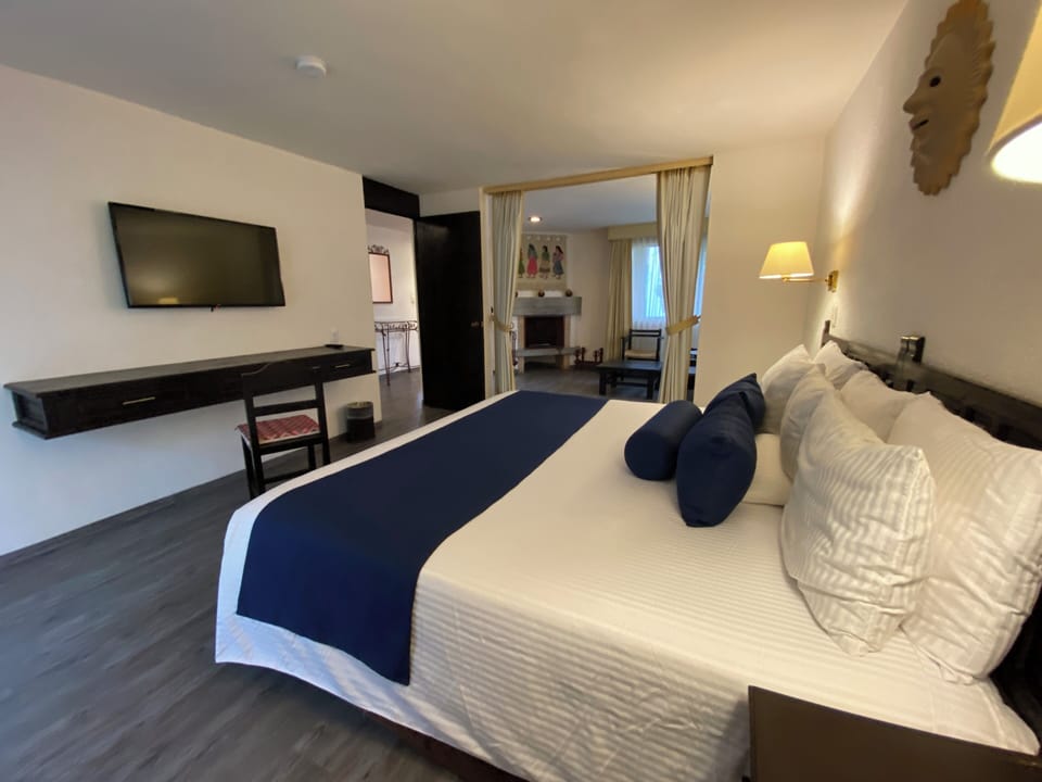 Grand Suite | Blackout drapes, iron/ironing board, bed sheets