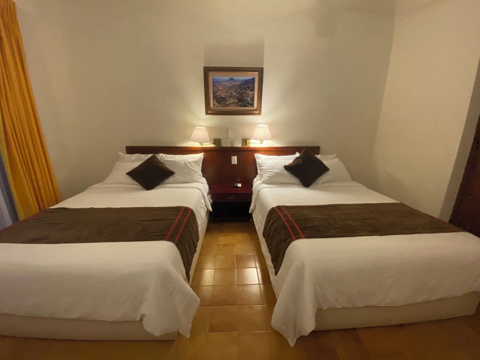 Comfort Double Room, City View | Desk, blackout drapes