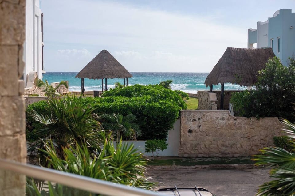 This unit offers a secluded balcony with stunning views of the Caribbean Sea—an ideal spot to sip your morning coffee or evening drink while soaking in the refreshing ocean breeze.