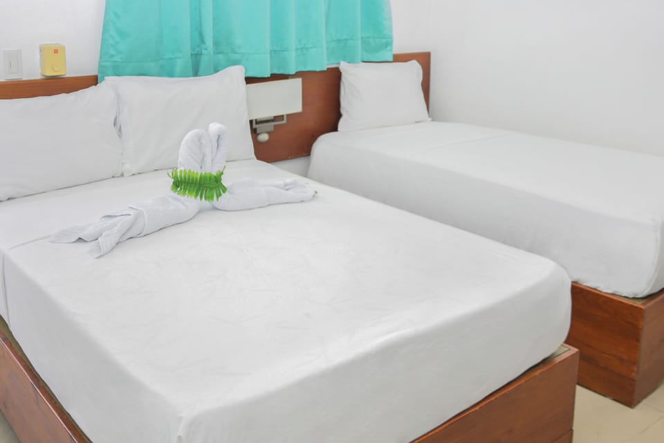 Double Room, Balcony, Bay View | Blackout drapes, iron/ironing board, free WiFi, bed sheets