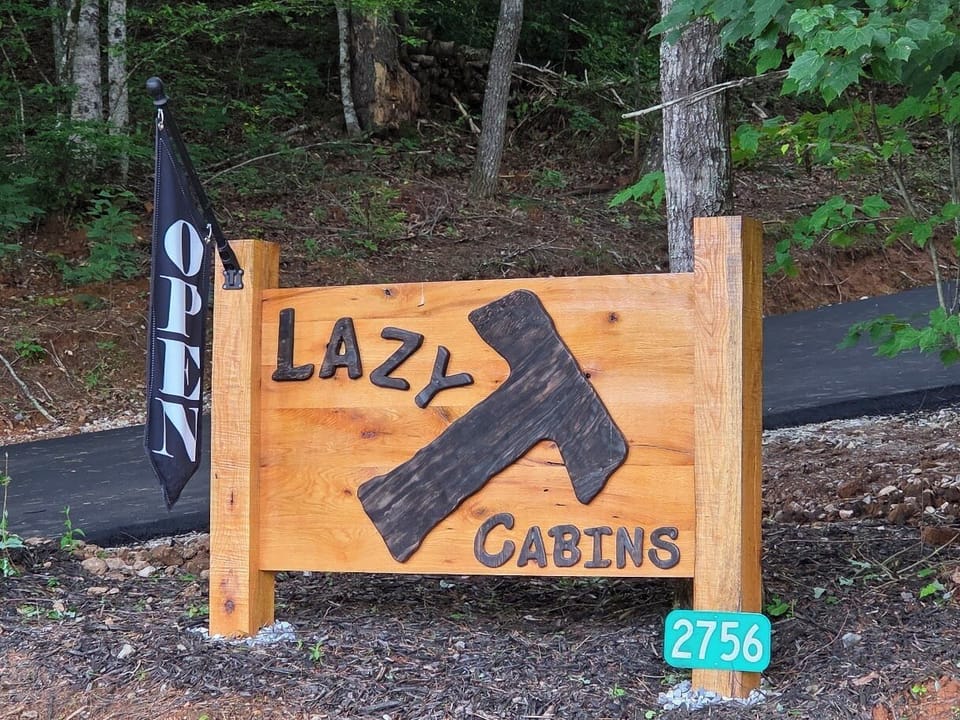 Sign with paved driveway