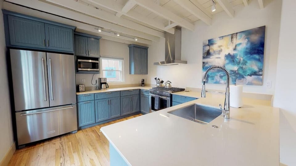 Large countertop space with large cabinet space