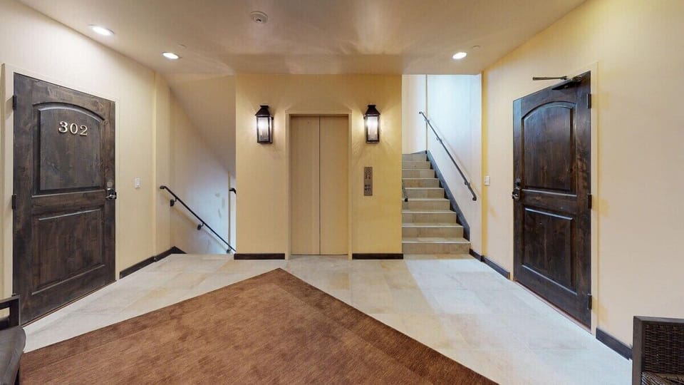 Hallway and lobby with elevator