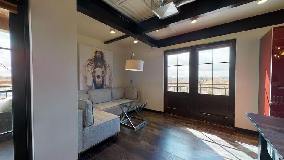 Sectional sitting nook with access to private West facing balcony