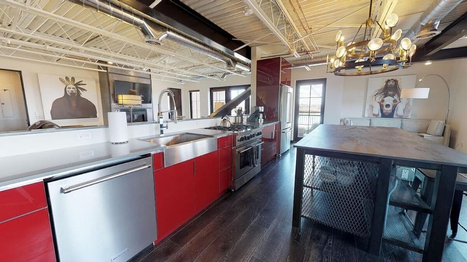 Full size kitchen with stainless steel chef-grade appliances