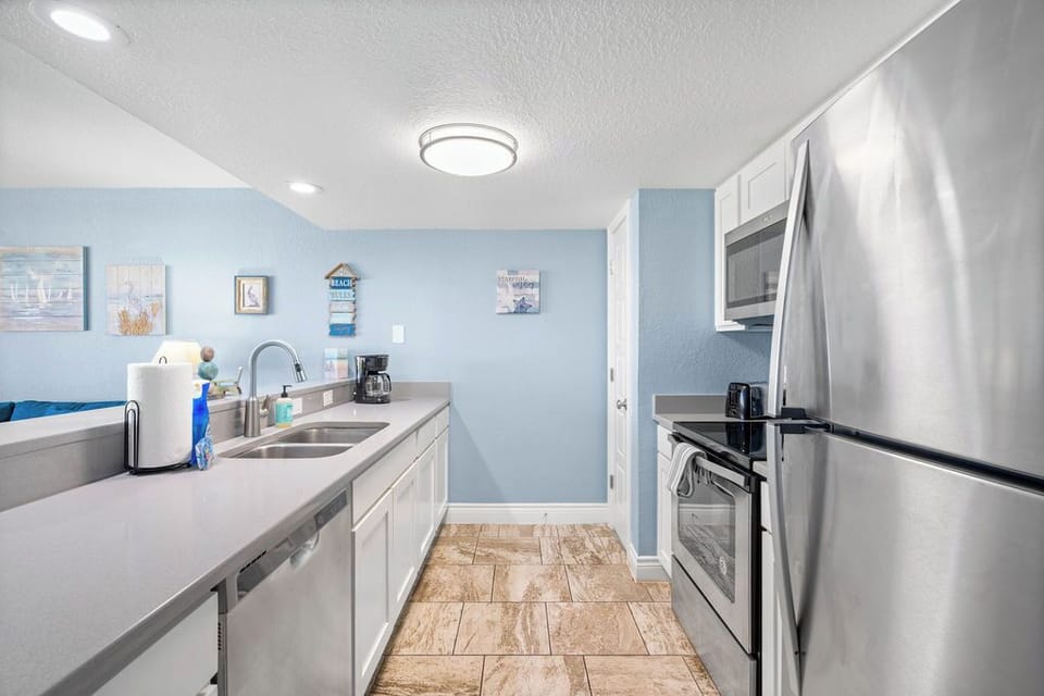 Full Fridge, Stove/Oven, Microwave, Double Sink and Dishwasher