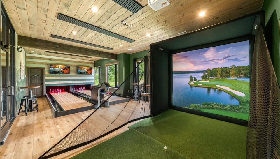 This grand getaway is THE ultimate destination designed for maximum entertainment! Enjoy your own indoor dukpin bowling alley and golf simulator