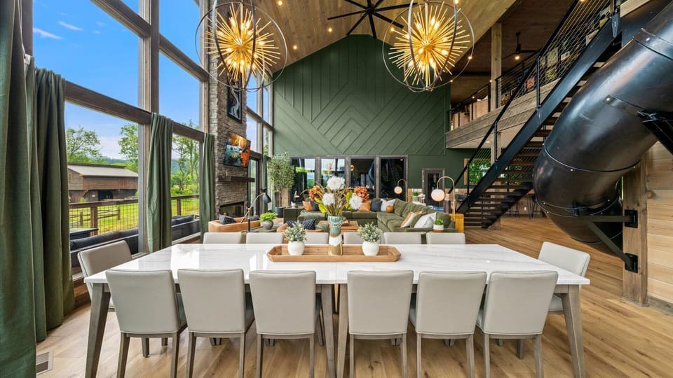 Dine in style under soaring ceilings and statement lighting